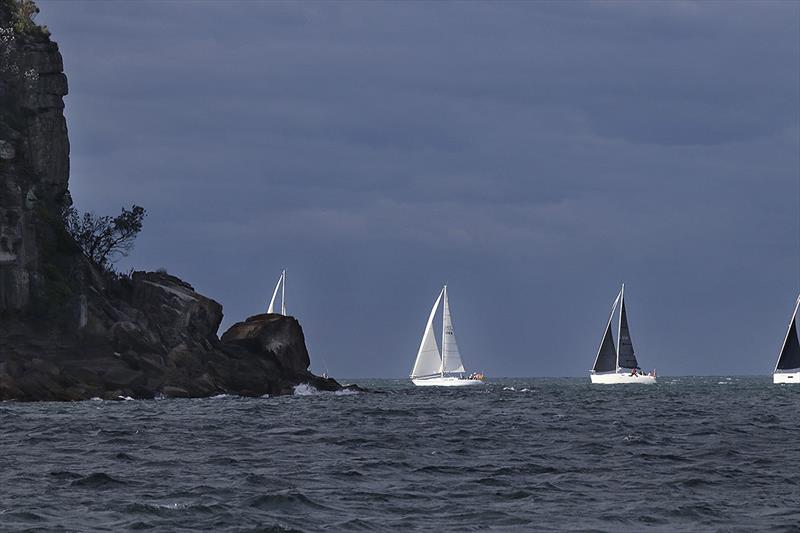 The fleet heads around Lion Island at what was possibly the worst part of the day, weather wise photo copyright John Curnow taken at Royal Prince Alfred Yacht Club and featuring the Beneteau class