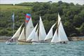Crossing the finishing line in the idyllic conditions experienced on the Friday of Falmouth Classics 2022 © Nigel Sharp