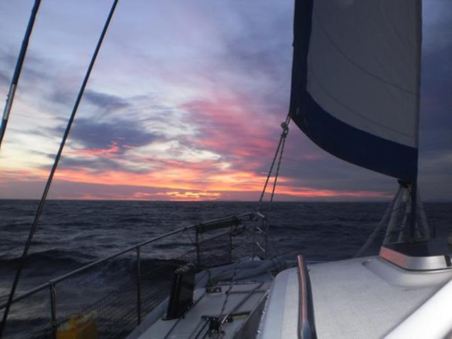 Sunrise of Cape Farewell- Day 8 of crossing the Tasman photo copyright Multihull Central taken at  and featuring the Cruising Yacht class