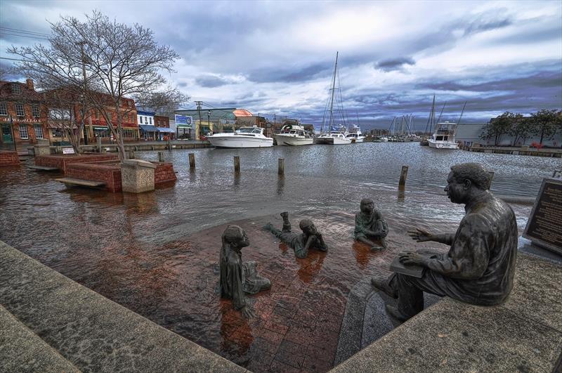 Sea level rise above the city's existing sea walls regularly floods the City Dock in Annapolis, Maryland. - photo © Amy McGovern
