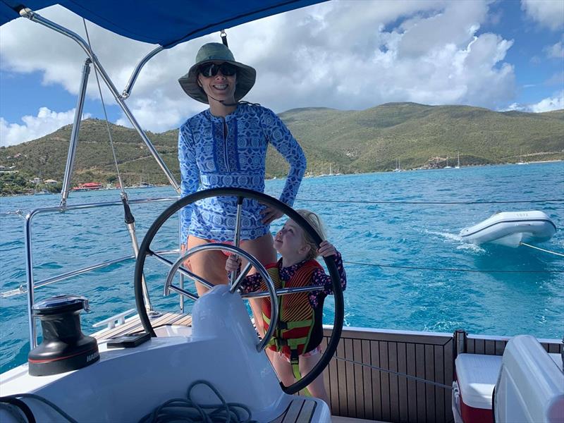 Emilie wanted to take the helm while headed to Leverick Bay photo copyright Catherine Guiader taken at  and featuring the Cruising Yacht class