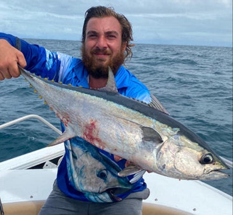 Longtail tuna are once again abundant throughout the southern and eastern bay. Here is Dylan with a typical school fish - photo © Fisho's Tackle World