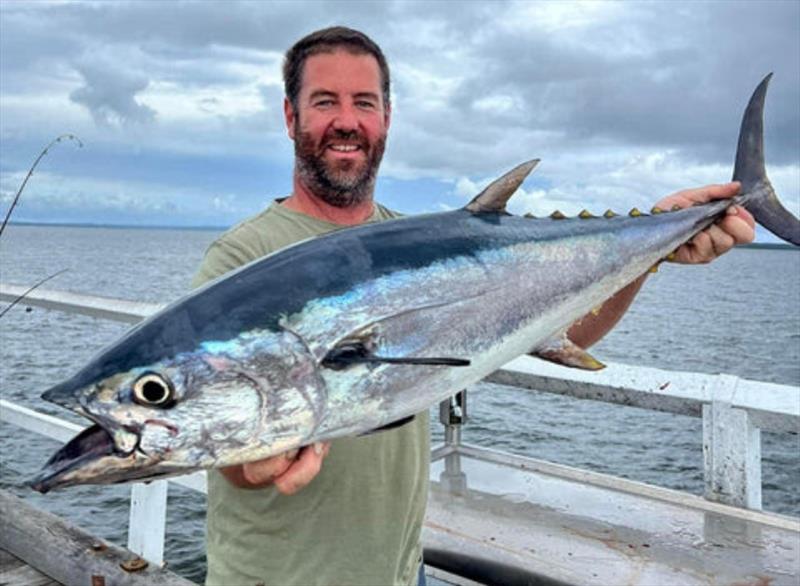 It was a dream come true for Ben when he spun this ripper longtail tuna up from the Urangan Pier - photo © Fisho's Tackle World