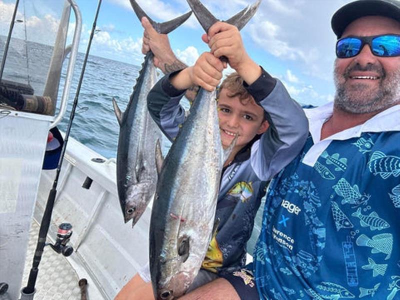 Keets and Joey with a brace of Hervey Bay longtails. Great fun for the family fisho photo copyright Fisho's Tackle World taken at  and featuring the Fishing boat class