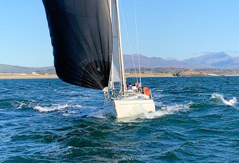 Pastime of Hamble against the backdrop of the Snowdonia range - Pwllheli Winter Series day 2 photo copyright Stuart Trunkfield taken at Pwllheli Sailing Club and featuring the IRC class