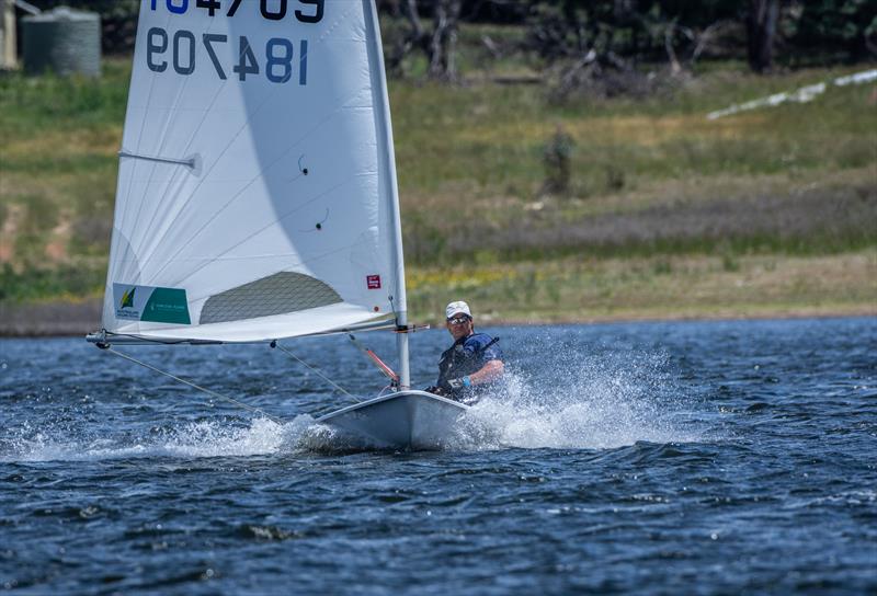 Pierre Gal, former America's Cup sailor, Sydney-Hobart class winner and multiple national champion, drives downwind at the last Thunderbolt Regatta photo copyright Paulo Lagos taken at New England Sailing Club and featuring the ILCA 7 class