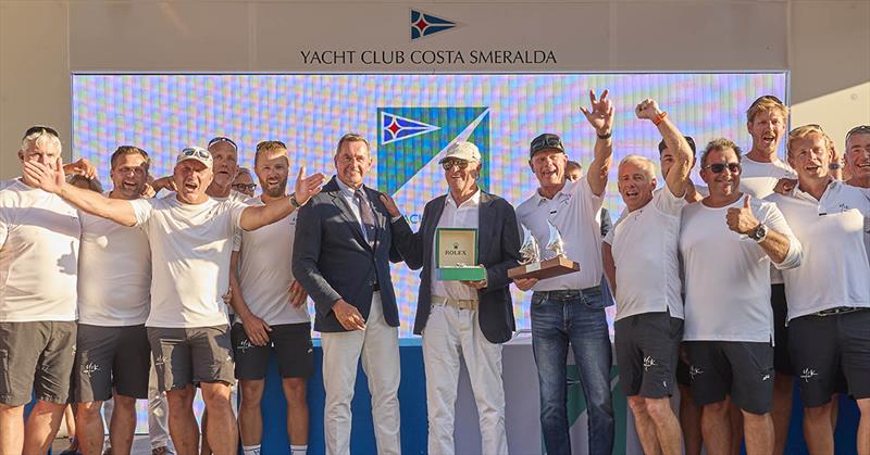 Maxi Yacht Rolex Cup prizegiving ceremony - Michael Illbruck (YCCS Commodore)Y3K, Sail n.: GER 101, Class: SUPERMAXI, Model / Designer / Shipyard: Wally 101.1 / Judel-Vrolijk / Performance boats, Loa: `30, 80`, Owner: Offen Yachting Ltd photo copyright Carlo Borlenghi taken at Yacht Club Costa Smeralda and featuring the Maxi class