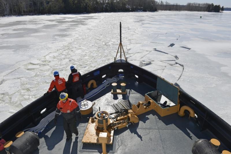 The crew of the Coast Guard Cutter Thunder Bay breaks ice along the Kennebec River, in Gardiner, Maine, March 27, 2014. The Thunder Bay began icebreaking on the river to relieve flood potential as spring appears on the horizon photo copyright U.S. Coast Guard / Rob Simpson taken at 
