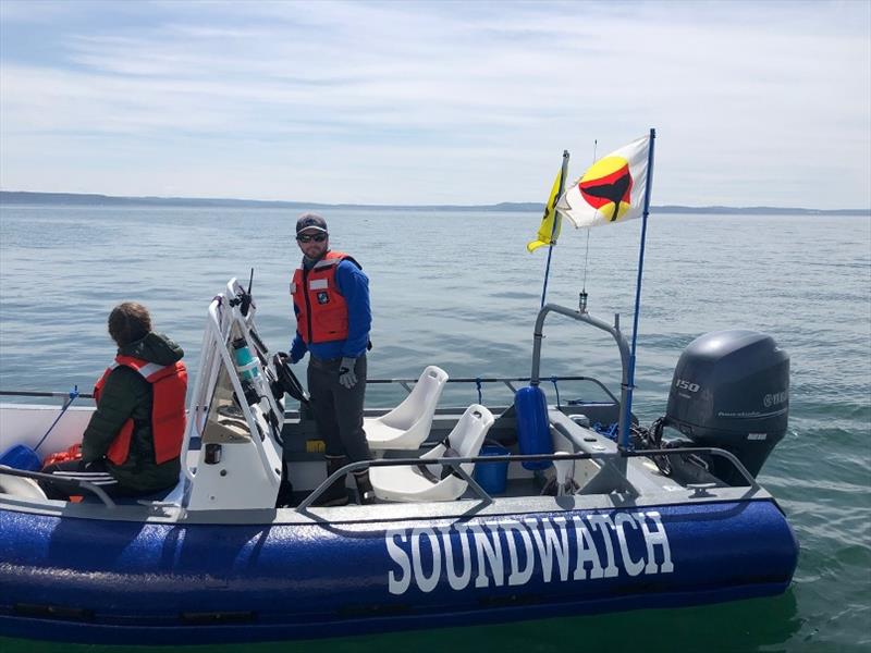 Soundwatch Boater Education Program boat displaying the new whale warning flag. - photo © Frances Robertson, San Juan County Marine Resources Committee