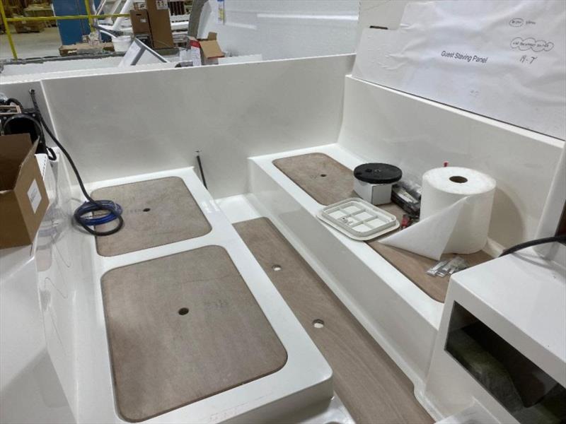 Guest berth molded in to the internal glass unit (right-side-up) - photo © Back Cove Yachts