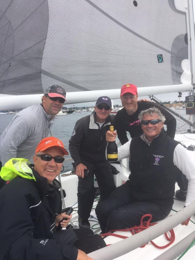 Crew of Spirit receiving their Prosecco at the finish line last year - Ida Lewis Distance Race photo copyright Barby MacGowan taken at Ida Lewis Yacht Club