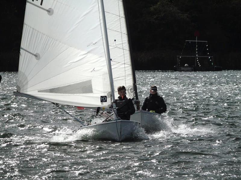 Ollie Goodhead chasing Tom Temple during the South Staffs OK Open photo copyright SSSC taken at South Staffordshire Sailing Club and featuring the OK class