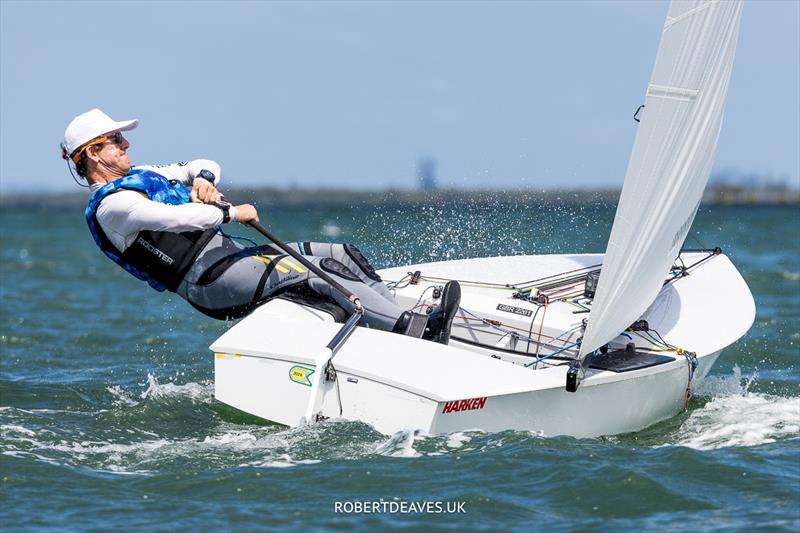 Nick Craig, GBR on day 2 of the 2024 OK Dinghy World Championship Brisbane photo copyright Robert Deaves / www.robertdeaves.uk taken at Royal Queensland Yacht Squadron and featuring the OK class