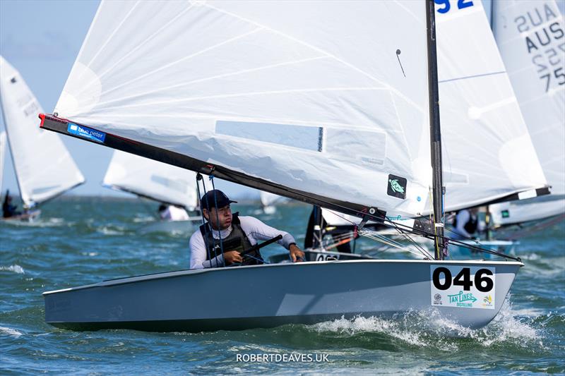 Roger Blasse, AUS on day 3 of the 2024 OK Dinghy World Championship Brisbane photo copyright Robert Deaves / www.robertdeaves.uk taken at Royal Queensland Yacht Squadron and featuring the OK class