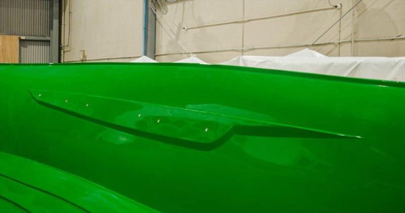 Reflections on the hull mould illustrate the level of polishing required - photo © Riviera Australia
