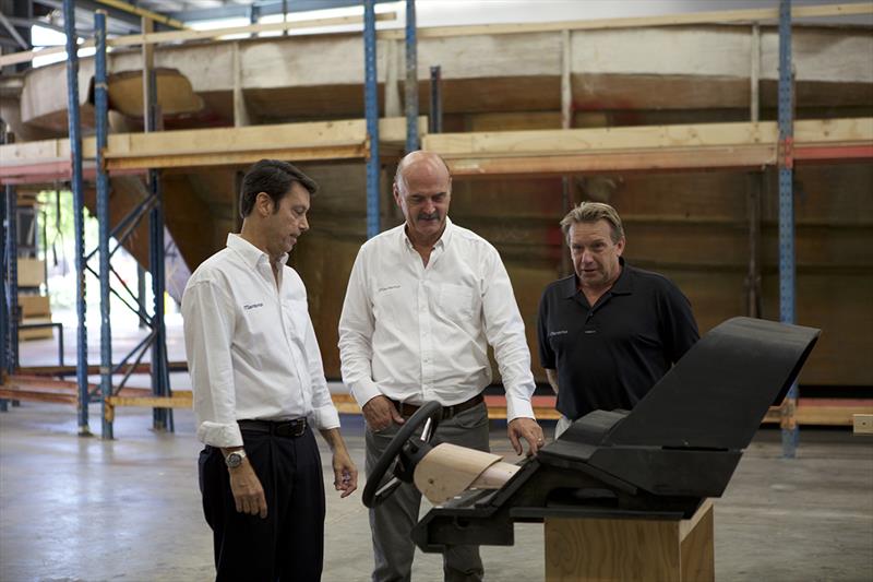 (L to R) Maritimo CEO Garth Corbitt, General Manager Operations, Phil Candler and Production Manager Kym Fleet are show with one of the new dashboard configurations by Maritimo in the new facility photo copyright Promedia taken at  and featuring the Power boat class