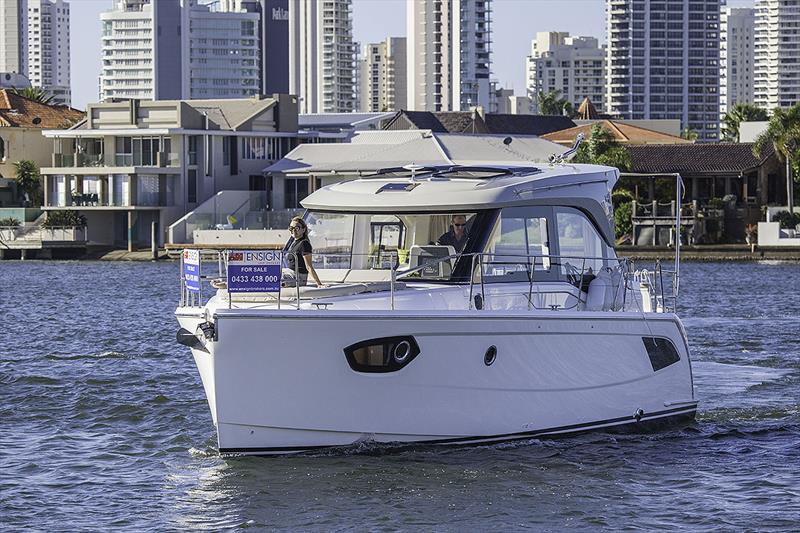 Fitting right in to her surroundings - the Bavaria E34 - photo © John Curnow