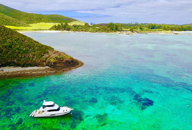 Moored in the lagoon at Lord Howe Island photo copyright Riviera Australia taken at  and featuring the Power boat class