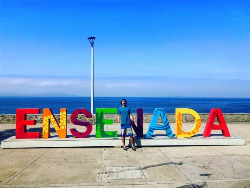 Lance in-front of the famous Ensenada sign - photo © Pendana Blog, www.pendanablog.com