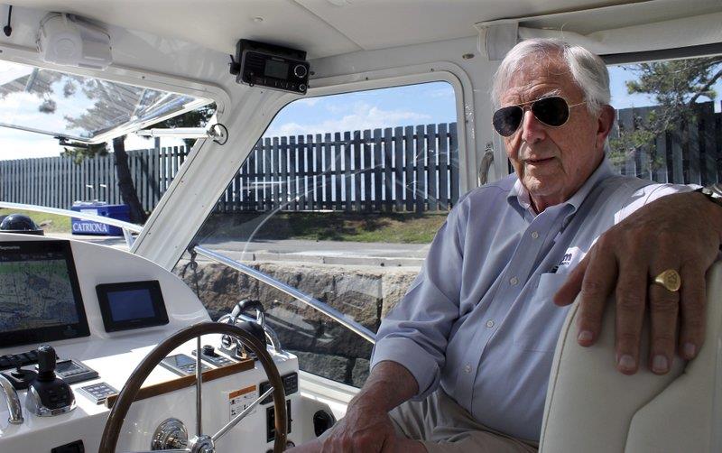 Bob Johnstone, CEO of MJM Yachts, sits inside an MJM boat docked in Newport, R.I photo copyright Michelle R. Smith taken at  and featuring the Power boat class