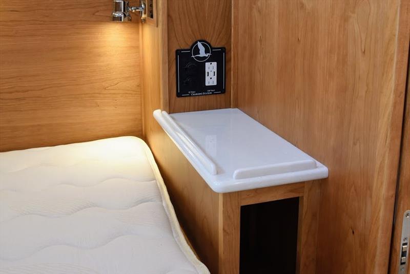 Replace hanging locker with side table (same surface as head & galley) – Charging station moved to above the side table photo copyright Jamie Governale taken at  and featuring the Power boat class