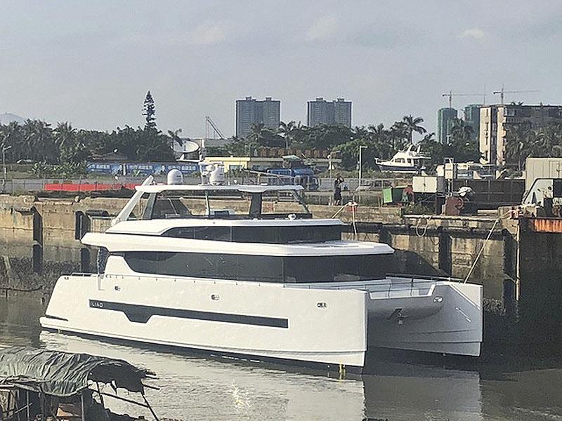 New Iliad 70 get splashed ahead of sea trials, and then unveiling to new owner and premiere at the Sydney International Boat Show - photo © Multihull Solutions