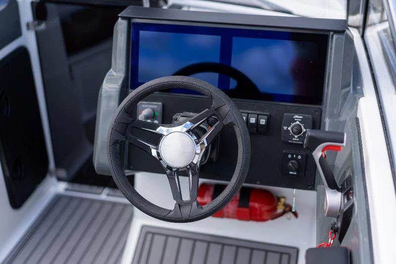 Directly in front of the helmsman is a new Q wide infotainment display with two views that can be individually customised photo copyright Yamarin Cross taken at  and featuring the Power boat class