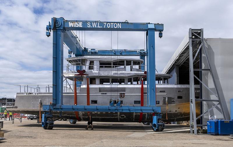 Arksen 85 moves between sheds at Wight Shipyard Co., Isle of Wight, England photo copyright Ian Roman taken at  and featuring the Power boat class
