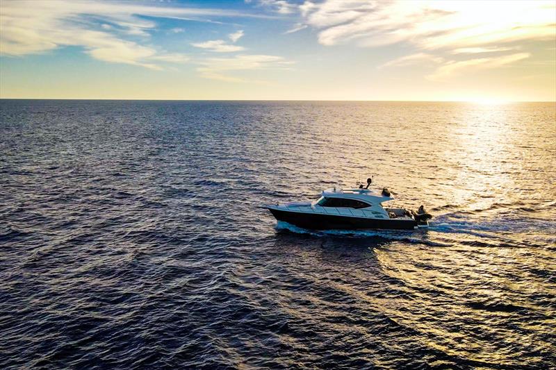 Heading south, Caroline 2.0 in the Pacific Ocean on the way to her new home on the east coast of the USA photo copyright Riviera Australia taken at  and featuring the Power boat class