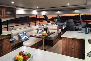 Stylish saloon and gourmet galley of the Riviera 5400 Sport Yacht photo copyright Riviera Australia taken at  and featuring the  class