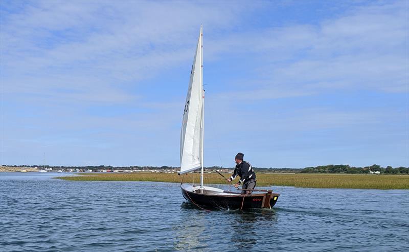 The 'dark lord' a.k.a. Andy Ash-Vie sailing his Scow at Keyhaven photo copyright Mark Jardine taken at Keyhaven Yacht Club and featuring the Scow class