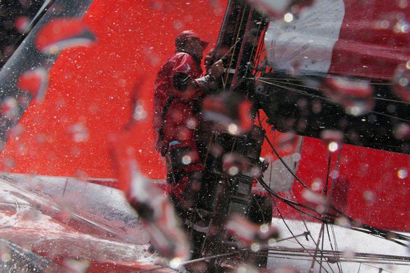 Sidney Gavignet gets the mainsail ready to reef, en route to Rio de Janeiro on leg 5 of the Volvo Ocean Race 2008-09 photo copyright Rick Deppe / Volvo AB taken at  and featuring the Volvo One-Design class