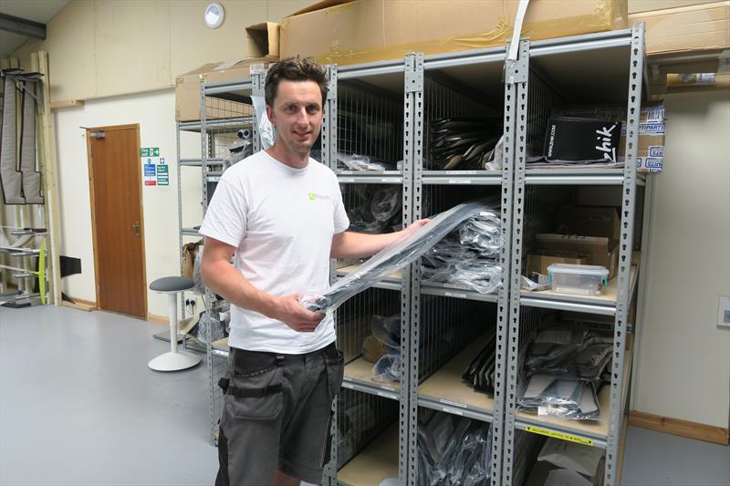 Simon Maguire at the newly opened on-site spares store allowing owners to order spares and upgraded parts online photo copyright Jake Kavanagh taken at  and featuring the  class