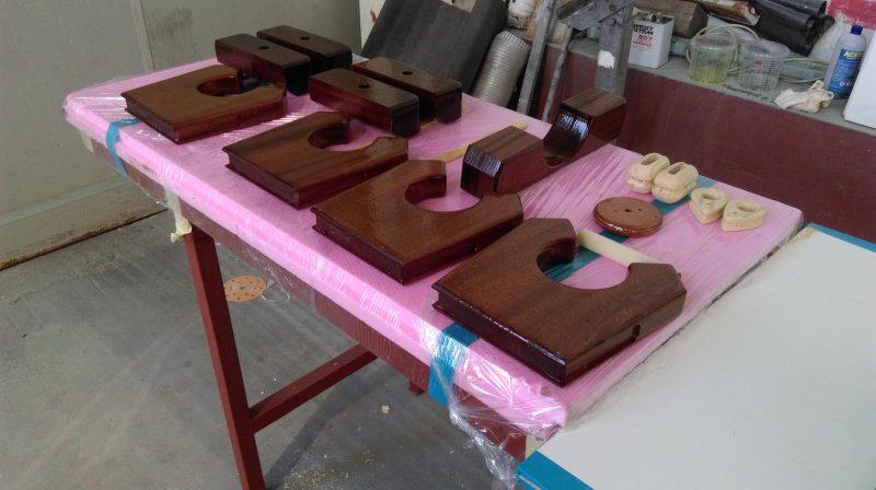 The shapes for the rowlocks, blocks and other functional pieces have been cut from solid mahogany photo copyright Wessex Resins & Adhesives taken at  and featuring the  class